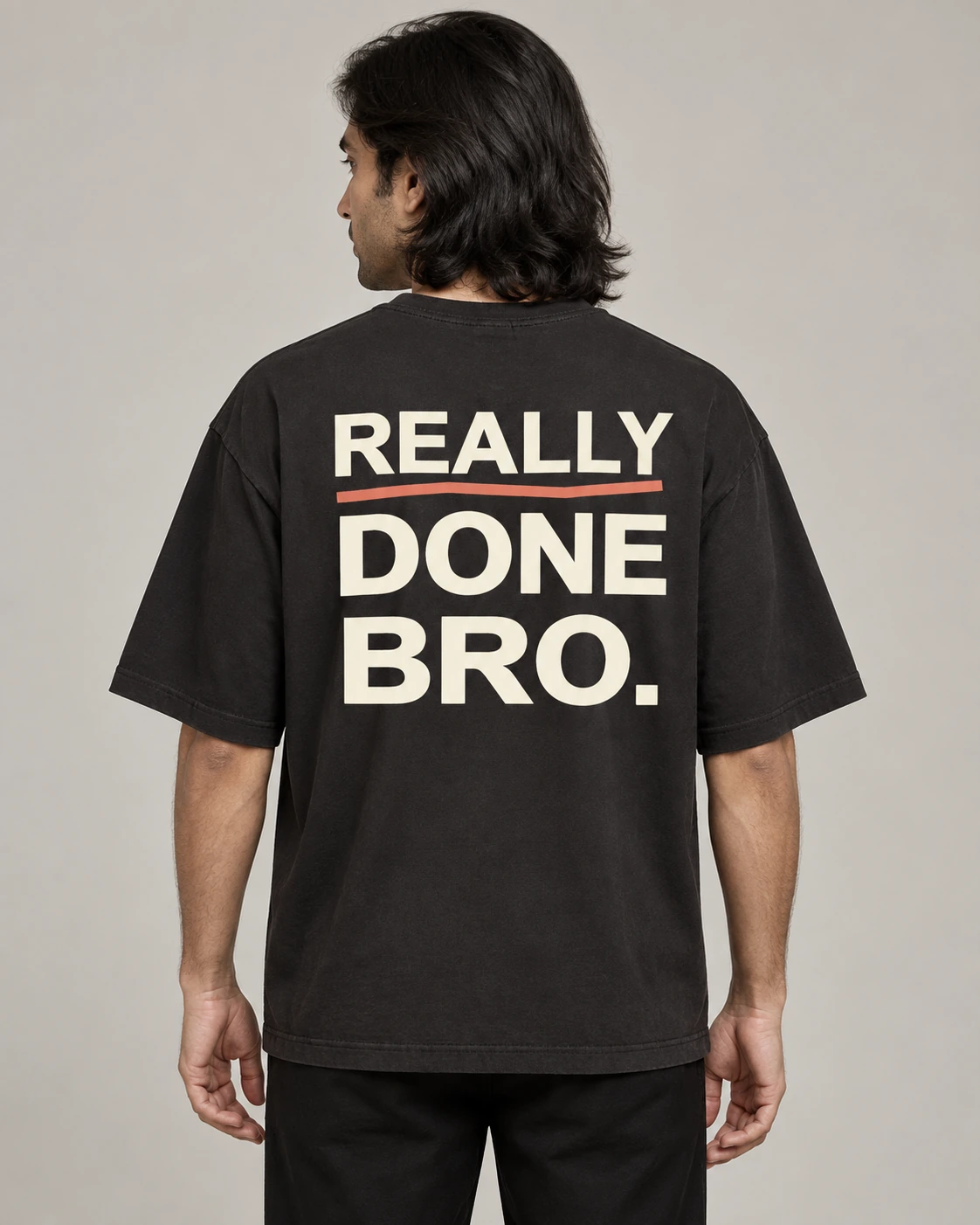 Really Done Bro in Washed Black, unisex oversized tee, back view